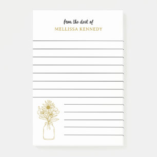 Gold und weiße Wildblume vom Schreibtisch der Post-it Klebezettel