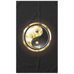 Gold Yin Yang auf schwarz Tischdecke
