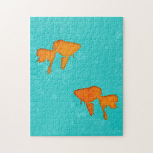 Goldbarsch-orangefarbene Silhouetten im türkisfarb Puzzle