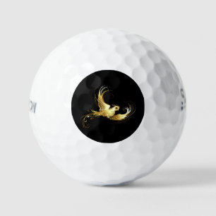 Golden Bird im schwarzen Hintergrund Golfball