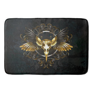 Golden Bird Skull auf schwarzem Hintergrund Badematte
