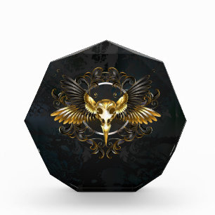 Golden Bird Skull auf schwarzem Hintergrund Fotoblock