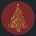 Golden Christmas Tree on Red Runder Aufkleber<br><div class="desc">Weihnachtsbaum in goldgelben Schattierungen zur Simulation von metallischem Gold. Der Weihnachtsbaum besteht aus Kehren mit Sternschmuck und mit einem goldenen Stern überragt. Set auf dunkelweihnachtrot.</div>
