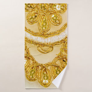 Golden gelber Spitzenstreifen. Hintergrundtextur, Badehandtuch