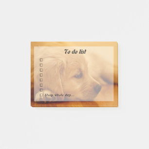 Golden Retriever Puppy zum Auflisten von Post-it-N Post-it Klebezettel