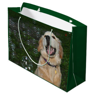 Golden retriever-Welpe in den Blasen Große Geschenktüte