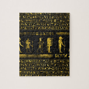 Goldene ägyptische Götter und Hieroglyphen auf Puzzle
