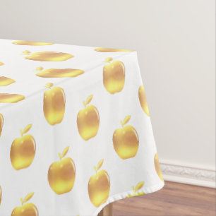 Goldene Äpfel auf weißem Tablett Tischdecke