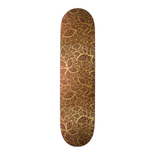 Goldene Blatspitze auf rotem Hintergrund Skateboard