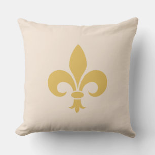 Goldene Fleur de Lis auf hellem Champagner-Beige Kissen
