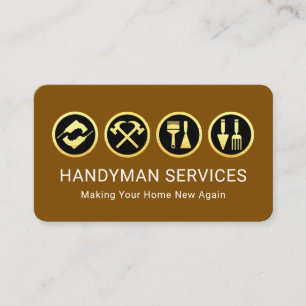 Goldene Handwerkerwerkzeuge auf brauner Schicht Visitenkarte