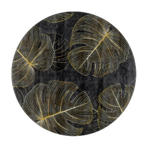 Goldene Monstera-Blätter, romantische nahtlose Blu Schneidebrett