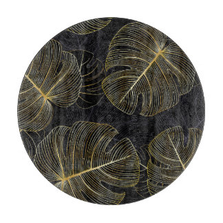 Goldene Monstera-Blätter, romantische nahtlose Blu Schneidebrett