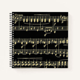 Goldene Musik auf schwarz Notizbuch