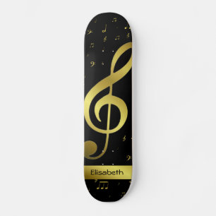 goldene Musiknoten auf schwarzem Skateboarddeck