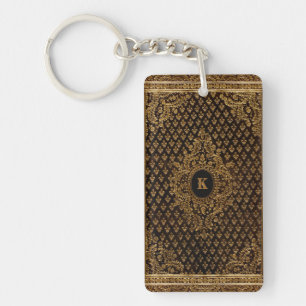 Goldene Ornamente mit der Monogramm Schlüsselanhänger