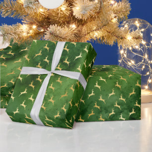 Goldene Rentiere auf dunkelgrünem Hintergrund Geschenkpapier