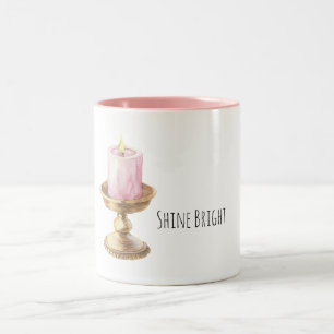 Goldene rosa Kerze leuchtet hell Zweifarbige Tasse