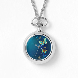 Goldene Schmetterlinge auf blauem Hintergrund Armbanduhr