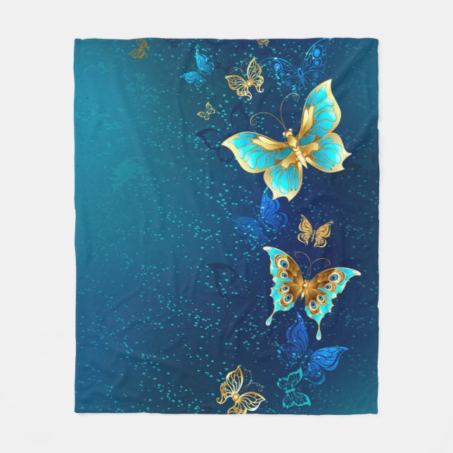 Goldene Schmetterlinge auf blauem Hintergrund Fleecedecke (Vorderseite)