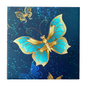 Goldene Schmetterlinge auf blauem Hintergrund Fliese