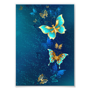 Goldene Schmetterlinge auf blauem Hintergrund Fotodruck