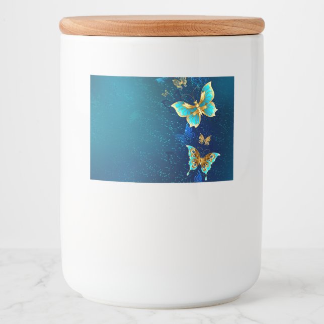 Goldene Schmetterlinge auf blauem Hintergrund Lebensmitteletikett (Vorderseite)