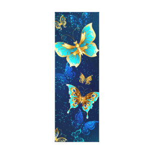 Goldene Schmetterlinge auf blauem Hintergrund Leinwanddruck