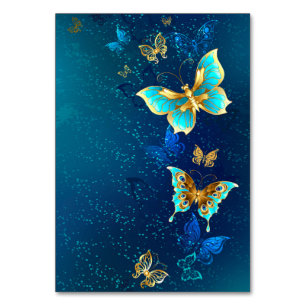 Goldene Schmetterlinge auf blauem Hintergrund Tischnummer