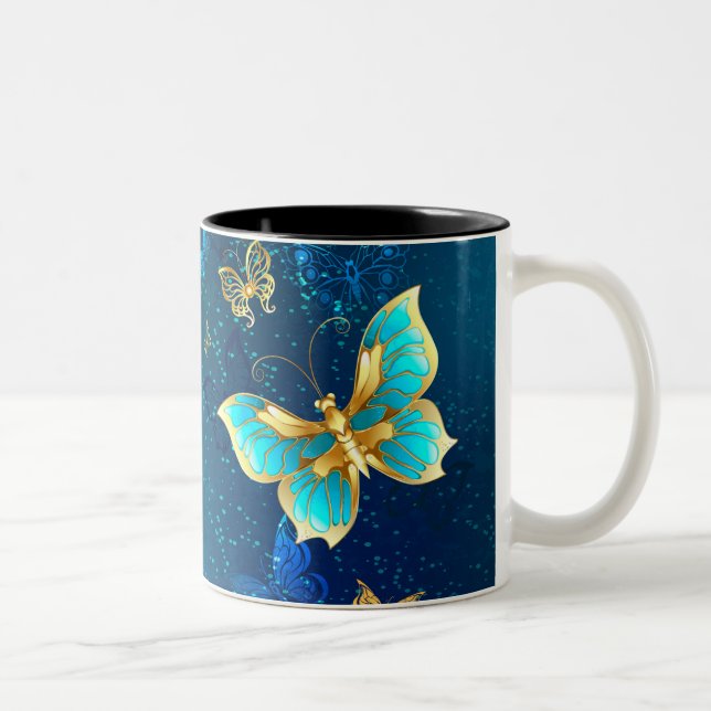 Goldene Schmetterlinge auf blauem Hintergrund Zweifarbige Tasse (Rechts)