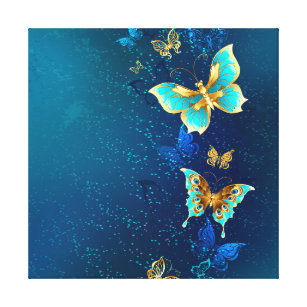 Goldene Schmetterlinge auf einem blauen Hintergrun Leinwanddruck
