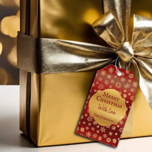 Goldene Schneeflocken auf dunkelrotem Hintergrund  Geschenkanhänger