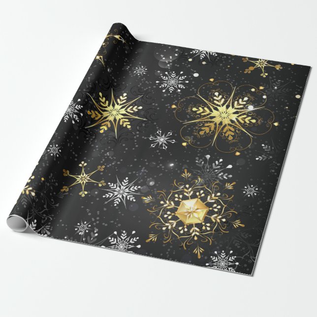 Goldene Schneeflocken auf schwarzem Hintergrund Geschenkpapier (Ungerollt)