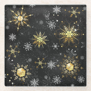 Goldene Schneeflocken auf schwarzem Hintergrund Glasuntersetzer