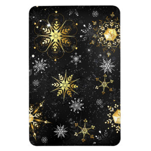 Goldene Schneeflocken auf schwarzem Hintergrund Magnet