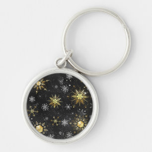 Goldene Schneeflocken auf schwarzem Hintergrund Schlüsselanhänger