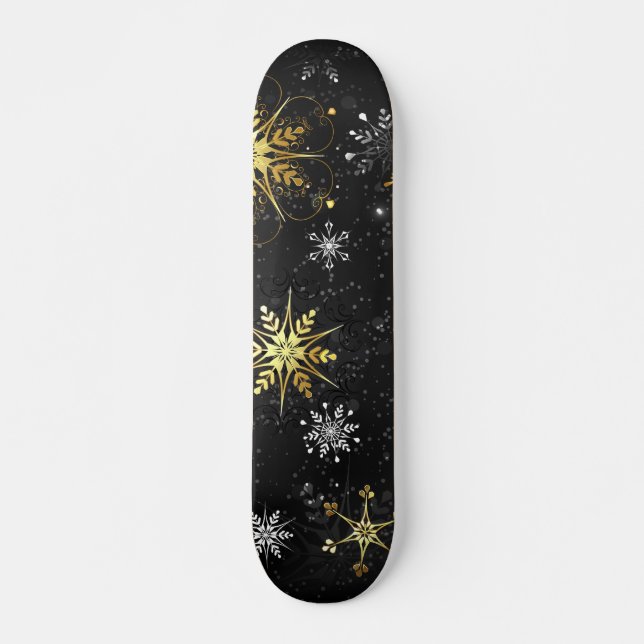 Goldene Schneeflocken auf schwarzem Hintergrund Skateboard (Vorne)