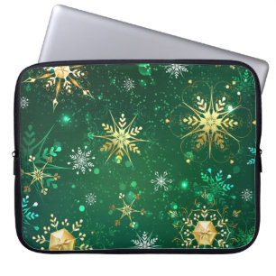 Goldene Schneeflocken im grünen Hintergrund Laptopschutzhülle