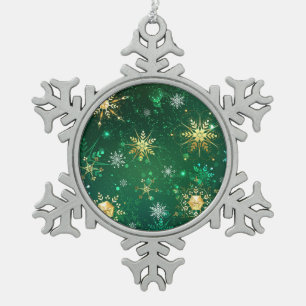 Goldene Schneeflocken im grünen Hintergrund Zinn-Ornament