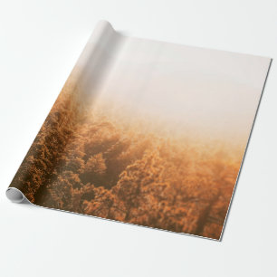 GOLDENE SONNE ÜBER EINEM WALD GESCHENKPAPIER