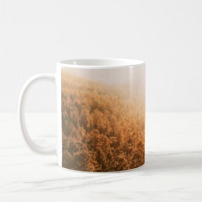 GOLDENE SONNE ÜBER EINEM WALD KAFFEETASSE (Links)