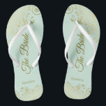 Goldene Spitze auf Mint Green The Bride Elegante H Flip Flops<br><div class="desc">Tanzen Sie die Nacht mit diesen schönen Hochzeitsflip-Flops. Sie sind für die Braut konzipiert und zeichnen sich durch ein schlichtes und dennoch elegantes Design aus, das mit goldfarbenen Schriftzeichen auf einem hellen neo-mint-grünen Hintergrund und extravaganten goldenen Spitzen-Gürteln und Wirbel besticht. Eine schöne Art, extravagant und angemessen bleibe, während Sie Ihren...</div>