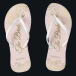 Goldene Spitze auf Rosa Die Braut Elegante Hochzei Flip Flops<br><div class="desc">Tanzen Sie die Nacht mit diesen schönen Hochzeitsflip-Flops. Sie sind für die Braut konzipiert und zeichnen sich durch ein schlichtes und dennoch elegantes Design aus, das mit goldfarbenen Schriftzeichen auf einem hellrot-rosa Hintergrund und extravaganten goldenen Spitzen-Gürteln und Wirbel besticht. Eine schöne Art, extravagant und angemessen bleibe, während Sie Ihren Füßen...</div>