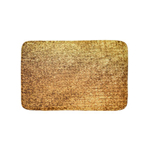 Goldene Textilien: glamouröser Makro-Hintergrund. Badematte