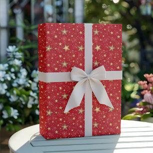 Goldene und rote Weihnachtsstern-Muster Geschenkpapier