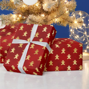 Goldene Weihnachts-Lebkuchenmänner auf Rot Geschenkpapier