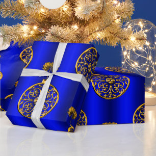 Goldene Weihnachtsbaumchen auf Blue Geschenkpapier