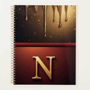 Goldener Buchstabe N Monogramm mit tropfender Meta Planer
