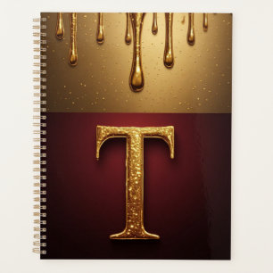 Goldener Buchstabe T Monogramm mit tropfender Meta Planer