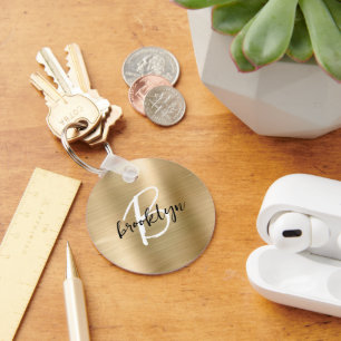 Goldener gebürsteter Metall-Schwarz-Weiß-Schrift-M Schlüsselanhänger